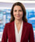 Margaux de Frouville, journaliste et experte santé, souriante sur le plateau de BFMTV.